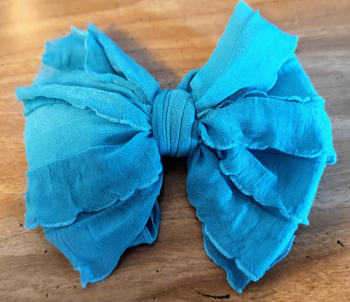 Teal ruffle bows and piggies